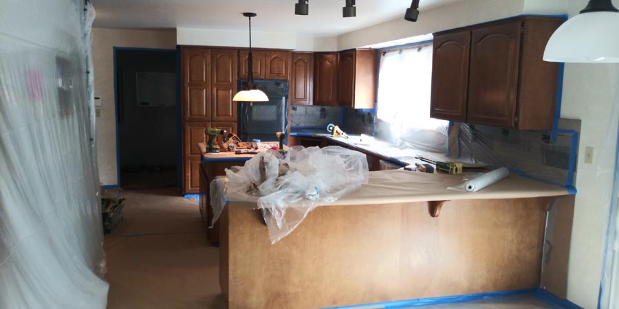 Kitchen with painted cabinets and island