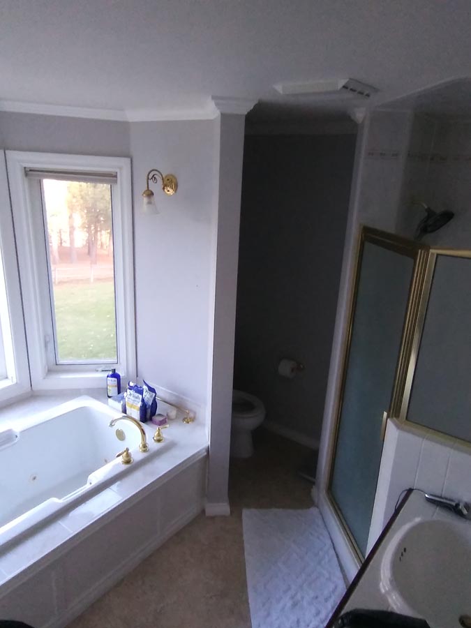 Painted bathroom with tub