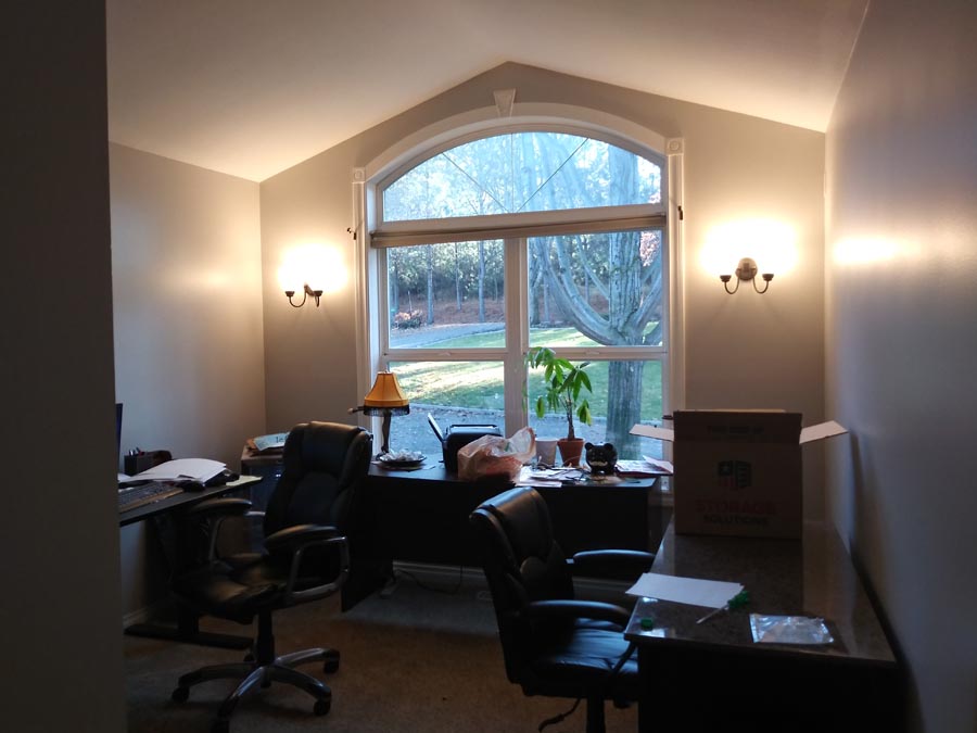 Painted home office with arched window